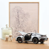 Porsche 911 Dakar 2023 Gris Glace métallisé 1/18