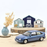 Opel Kadett GSi 1987 Light Blue met 1:18 - 200pcs