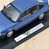 Opel Kadett GSi 1987 Light Blue met 1:18 - 200pcs