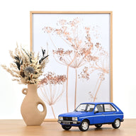 Modellino in miniatura Peugeot 504 1/18 MCG Break metallico blu 1976 Modellino in miniatura Peugeot 504 1/18 MCG Break metallico blu 1976