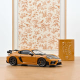 Porsche Cayman GT4 RS avec pack Weissach 2023 Jaune Bahama 1/18