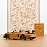 Porsche Cayman GT4 RS avec pack Weissach 2023 Jaune Bahama 1/18