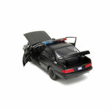 Ford Taurus noir avec figurine Robocop 1986 1/24